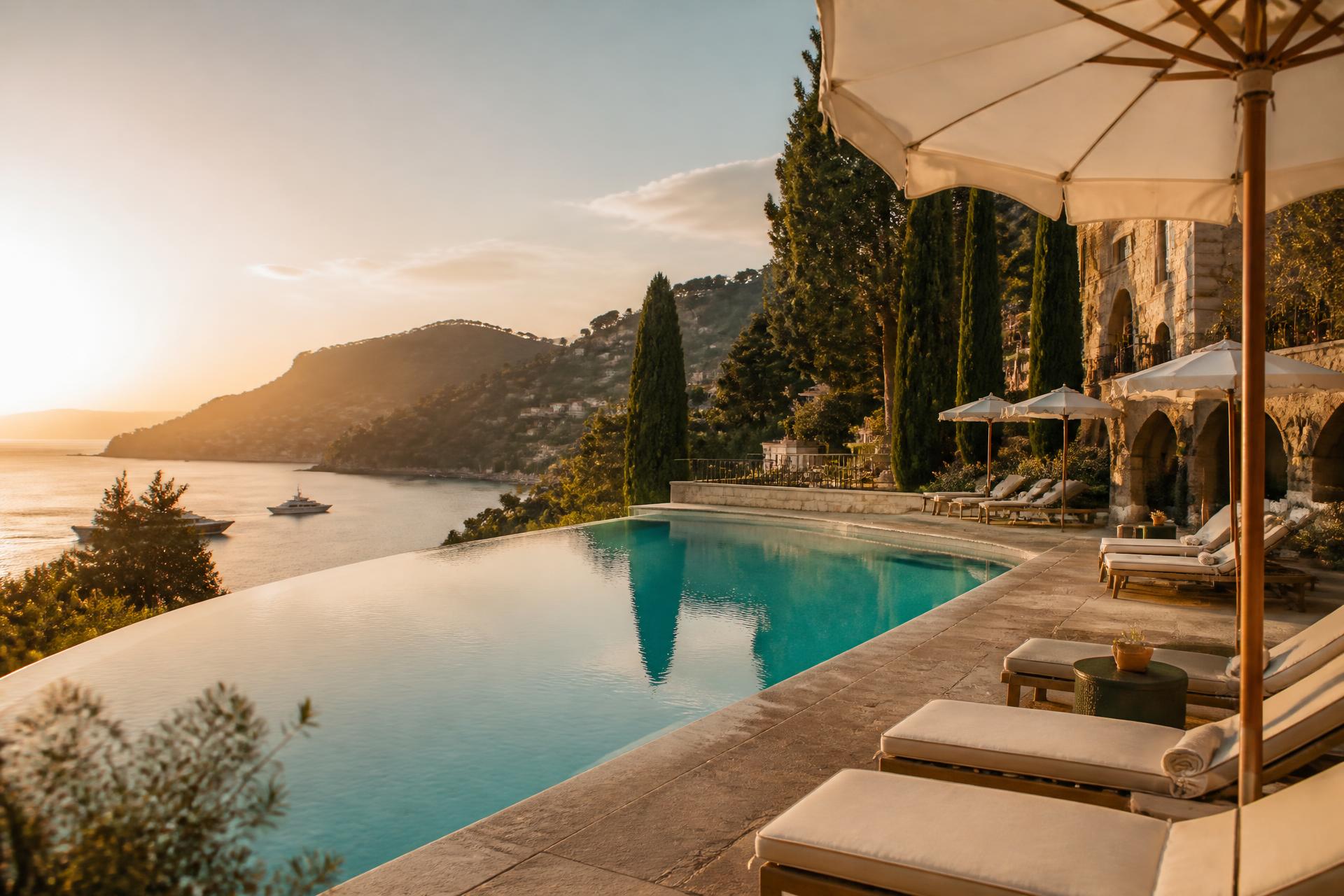 Infinity pool overlooking the Mediterranean at golden hour